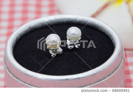 Beautiful genuine pearl earrings diaplay in jewelry box 88608981