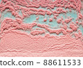 Pink crumbly background on a turquoise basis. 88611533