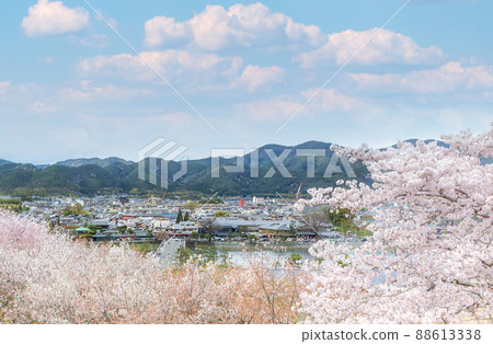 Scenery of Arashiyama and Sagano from the observatory of Horinji Temple with cherry blossoms in Kyoto Scenery of Arashiyama and Sagano from the observatory of Horinji Temple with cherry blossoms in Kyoto 88613338