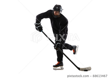 Portrait of professional hockey player, man training isolated over white studio background 88613467