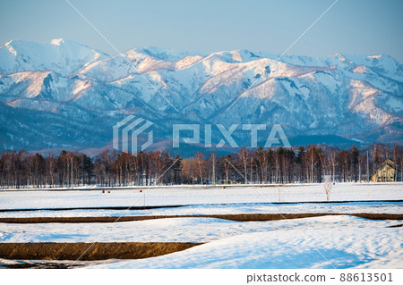 Hokkaido spring snowy mountain scenery 88613501