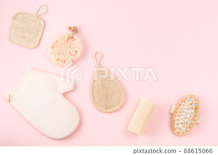 Reusable items for beauty treatment from organic biodegradable material on pink backdrop. 88615066