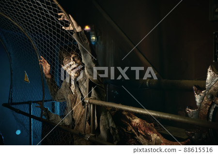 Ugly man with zombie greasepaint on face 88615516