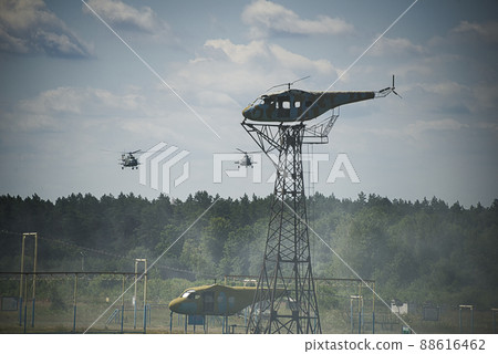 Helicopters with troops are approaching the landing point. 88616462