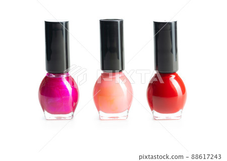 Colorful nail polish bottles isolated on white background. Colorful nail polish bottles isolated on white background. 88617243