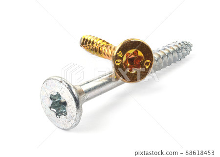 Gold torx screw isolated on white. Yellow zinc chipboard screw Torx, , full thread close up 88618453