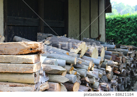 A lava piled beside an old folk house 88621184