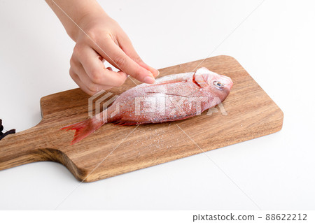 Sea bream sprinkled with salt Sea bream sprinkled with salt 88622212