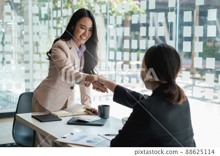 Business people successful negotiation and handshake. celebration partnership and teamwork, business deal concept. Business people successful negotiation and handshake. celebration partnership and teamwork, business deal concept. 88625114