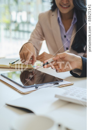 Image of Audit team working together and looking about transaction for corruption of company. Finance budget concept. Image of Audit team working together and looking about transaction for corruption of company. Finance budget concept. 88625141