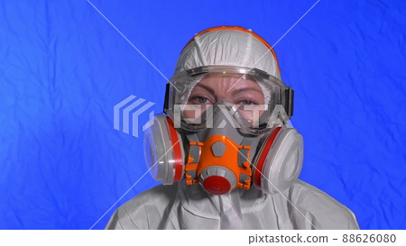 Scientist virologist in respirator. Woman close up look, wearing protective medical mask. Concept health safety N1H1 coronavirus epidemic 2019 nCoV. 88626080