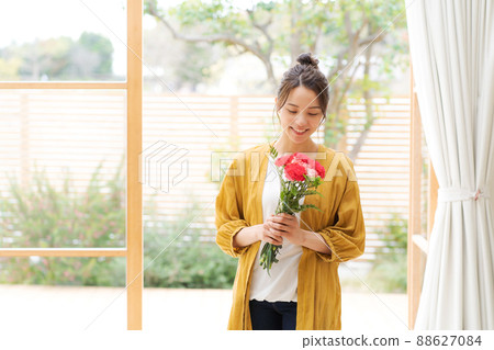 Woman with a bouquet Woman with a bouquet 88627084