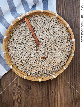 Organic sunflower seeds, spoon, food, cooking ingredients Organic sunflower seeds, spoon, food, cooking ingredients 88627350