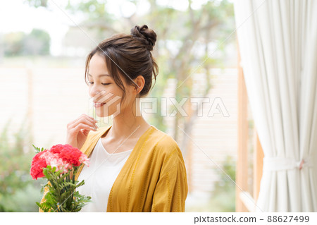 Woman with a bouquet Woman with a bouquet 88627499