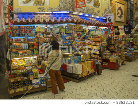 Okinawa, Japan - June 8,2019 : Unidentified people shopping at First Makishi Public Market in Naha, Okinawa, Japan on June 8,2019. Okinawa, Japan - June 8,2019 : Unidentified people shopping at First Makishi Public Market in Naha, Okinawa, Japan on June 8,2019. 88628151