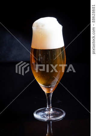 Beer poured into a glass Beer poured into a glass 88628681