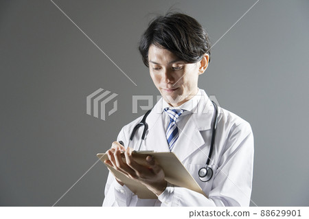 Male doctor portrait gray background Male doctor portrait gray background 88629901