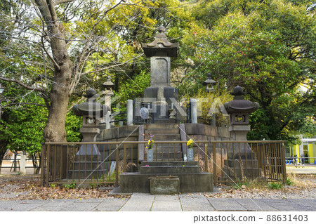 Tomb of Shogitai Warriors or Funeral monument to the Shogitai in Ueno Park, Tokyo, Japan  88631403