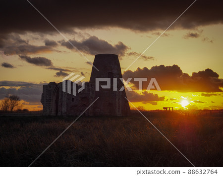 Beautiful orange sunset over the ruins of St. Benet's Abbey, Norfolk 88632764