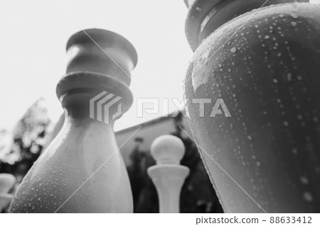 big chess pieces outside wet concept strategy 88633412