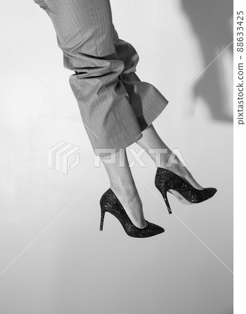 fashionable high heel shoes female legs background 88633425