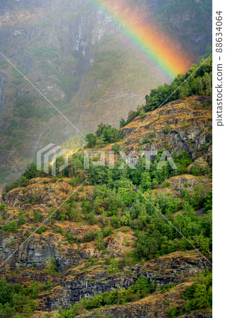 Rainbow in Norway mountains in summer 88634064