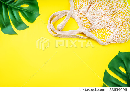Eco Bags.Zero waste, eco friendly shopping.Top view,flat lay.A variety of eco bags on a yellow background . Sustainable lifestyle.Zero waste minimal composition with tring and canvas bags for storage. Eco Bags.Zero waste, eco friendly shopping.Top view,flat lay.A variety of eco bags on a yellow background . Sustainable lifestyle.Zero waste minimal composition with tring and canvas bags for storage. 88634096