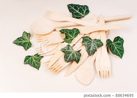 Eco friendly wooden cutlery.plastic free concept.Disposable wooden cutlery.Eco concept.Banner eco friendly disposable kitchenware .Wooden forks,spoons,zero waste.Copy space. 88634695