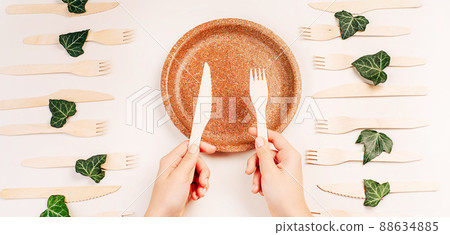 Banner eco friendly disposable kitchenware utensils on white background.Wooden forks,spoons,zero waste.Copy space.Eco friendly wooden cutlery.plastic free concept.Disposable wooden cutlery.Eco concept 88634885