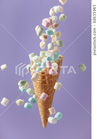 Marshmallows in a waffle cone. Marshmallows in a waffle cone. 88635965