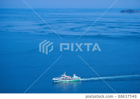 A large tide boat traveling through the Naruto Kaikyou in Tokushima Prefecture 88637548