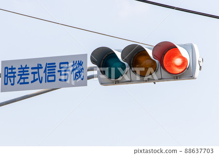 A traffic light that is lit in red. A traffic light that is lit in red. 88637703