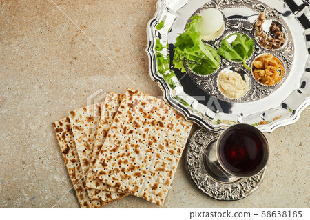 Passover Seder plate with traditional food ontravertine stone background Passover Seder plate with traditional food ontravertine stone background 88638185