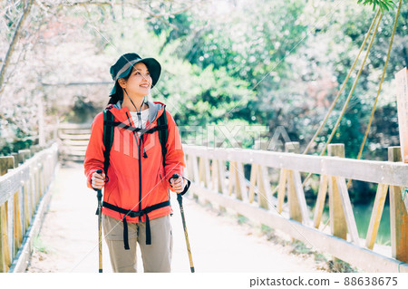 Climbing trekking woman Climbing trekking woman 88638675