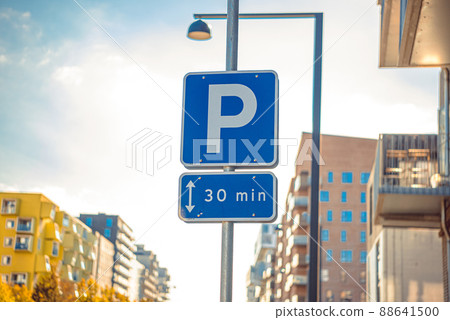 Road sign allowing parking for 30 minutes in a developing city area in Copenhagen, Denmark Road sign allowing parking for 30 minutes in a developing city area in Copenhagen, Denmark 88641500