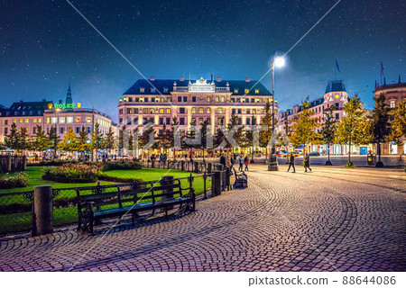 Night view of the public square Kongens Nytorv and the Hotel dAngleterre. Copenhagen, Denmark 88644086
