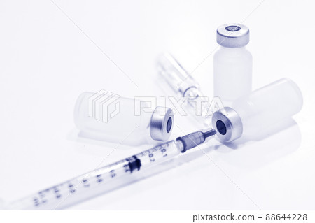 Vial of Drugs and 1 ml Plastic Syringe with Needle Isolated on the White Background 88644228