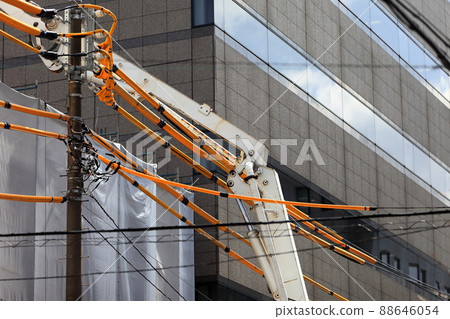 Image of concrete pump car boom and protective pipe 88646054