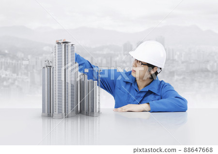 Architect and city apartment construction site and blueprint background with future real estate industry 88647668