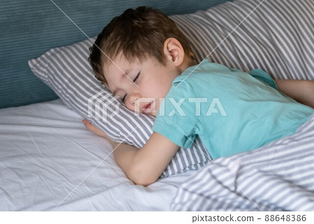 Little baby napping in the nursery. Closeup boy sleeping peacefully. Little baby napping in the nursery. Closeup boy sleeping peacefully. 88648386