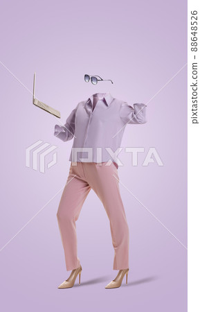 Portrait of invisible girl wearing modern business style pink outfit and eyeglasses using laptop on very peri color background. Concept of fashion, style 88648526