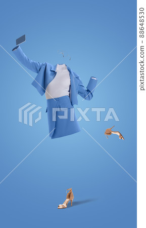 Creative portrait of invisible woman wearing modern business style blue outfit and heels using phone on blue background. Concept of fashion, style Creative portrait of invisible woman wearing modern business style blue outfit and heels using phone on blue background. Concept of fashion, style 88648530
