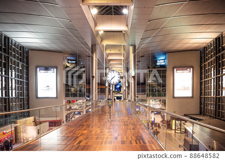 Kastrup international  Airport main hall with large round clock. Copenhagen, Denmark 88648582