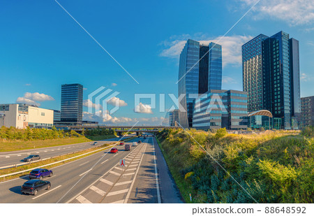 Modern buildings of hotel Crowne Plaza Copenhagen Towersand and oresundsmotorvejen highway in orestad, Copenhagen, Denmark Modern buildings of hotel Crowne Plaza Copenhagen Towersand and oresundsmotorvejen highway in orestad, Copenhagen, Denmark 88648592