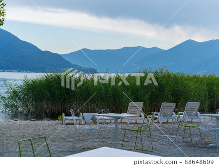 Evening sky over beach of Ascona, Switzerland 88648609