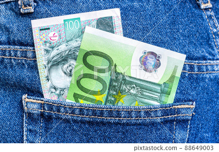Banknotes of Czech krona and Euro in jeans pocket 88649003