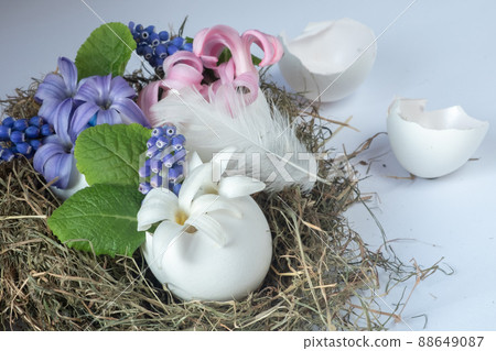 easter decor in a natural style. The eggshell is decorated with easter decor in a natural style. The eggshell is decorated with 88649087