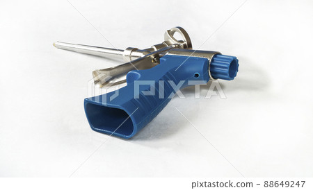 Instrument for construction foam on white background Instrument for construction foam on white background 88649247