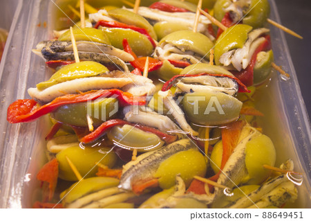 Olives stuffed with pepper and anchovy 88649451