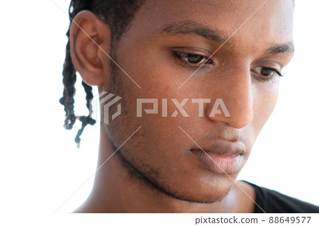 A portrait of a pensive man against a white background 88649577